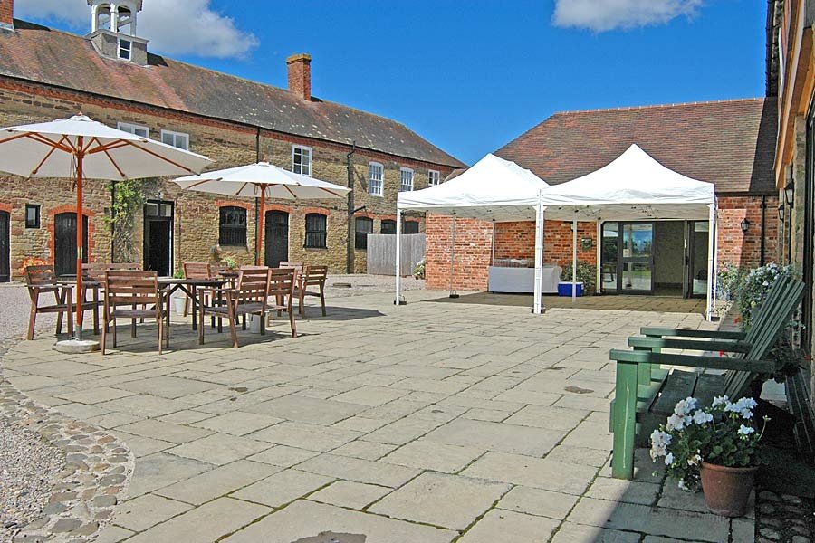 Coach house yard and canopy